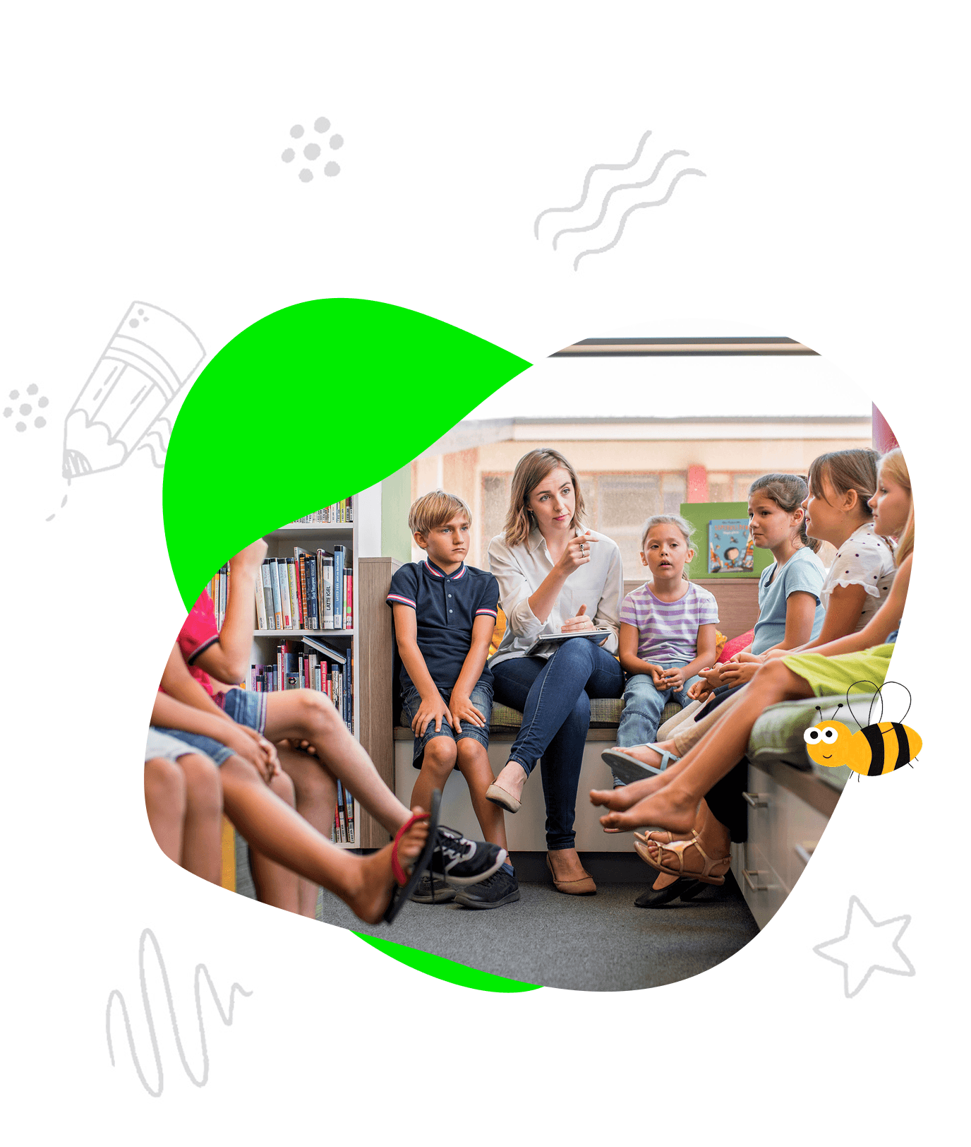 Teacher sitting with children in a classroom, talking about gratitude